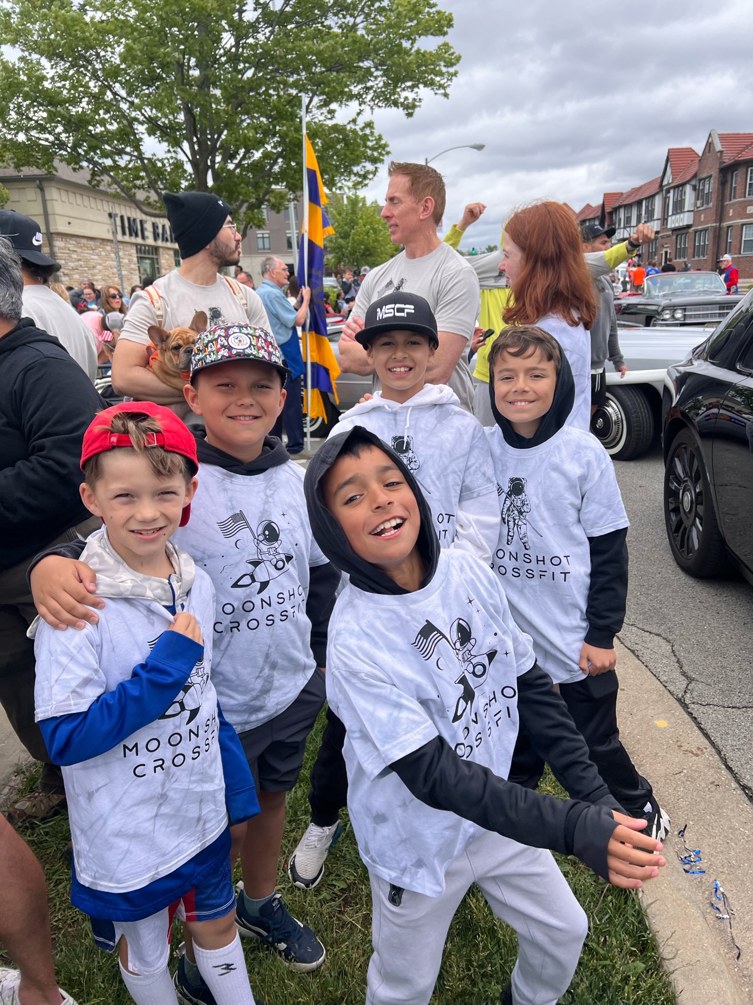 Moonshot CrossFit kids in a parade
