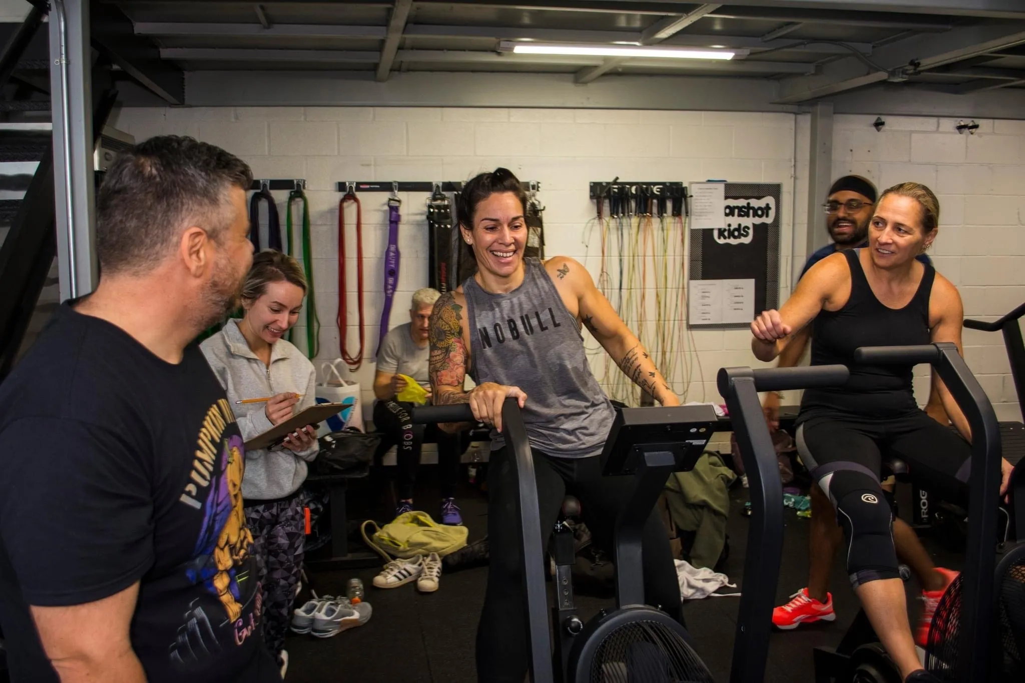 Dede coaching on a bike