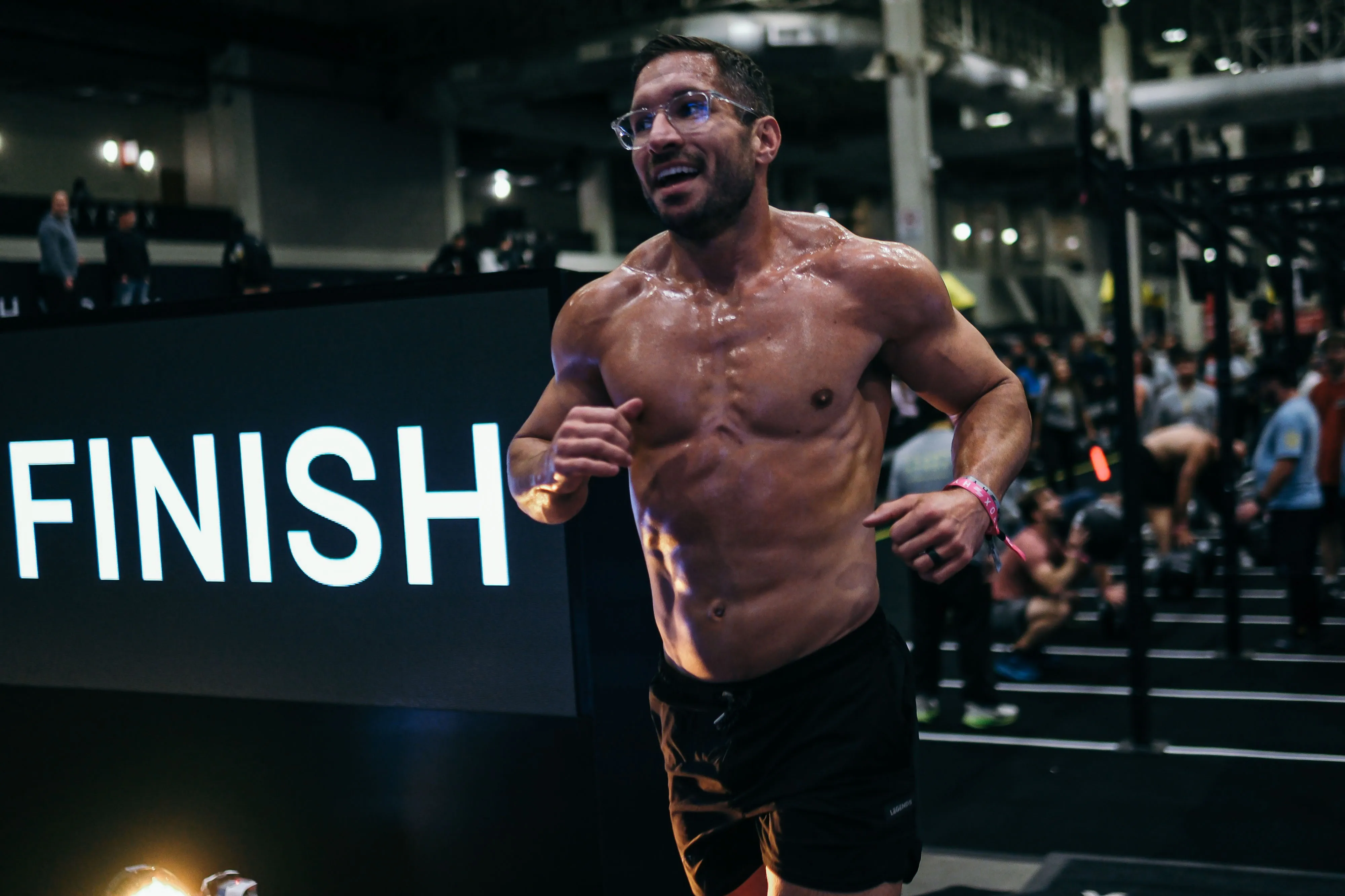 Athlete crossing the Hyrox finish line