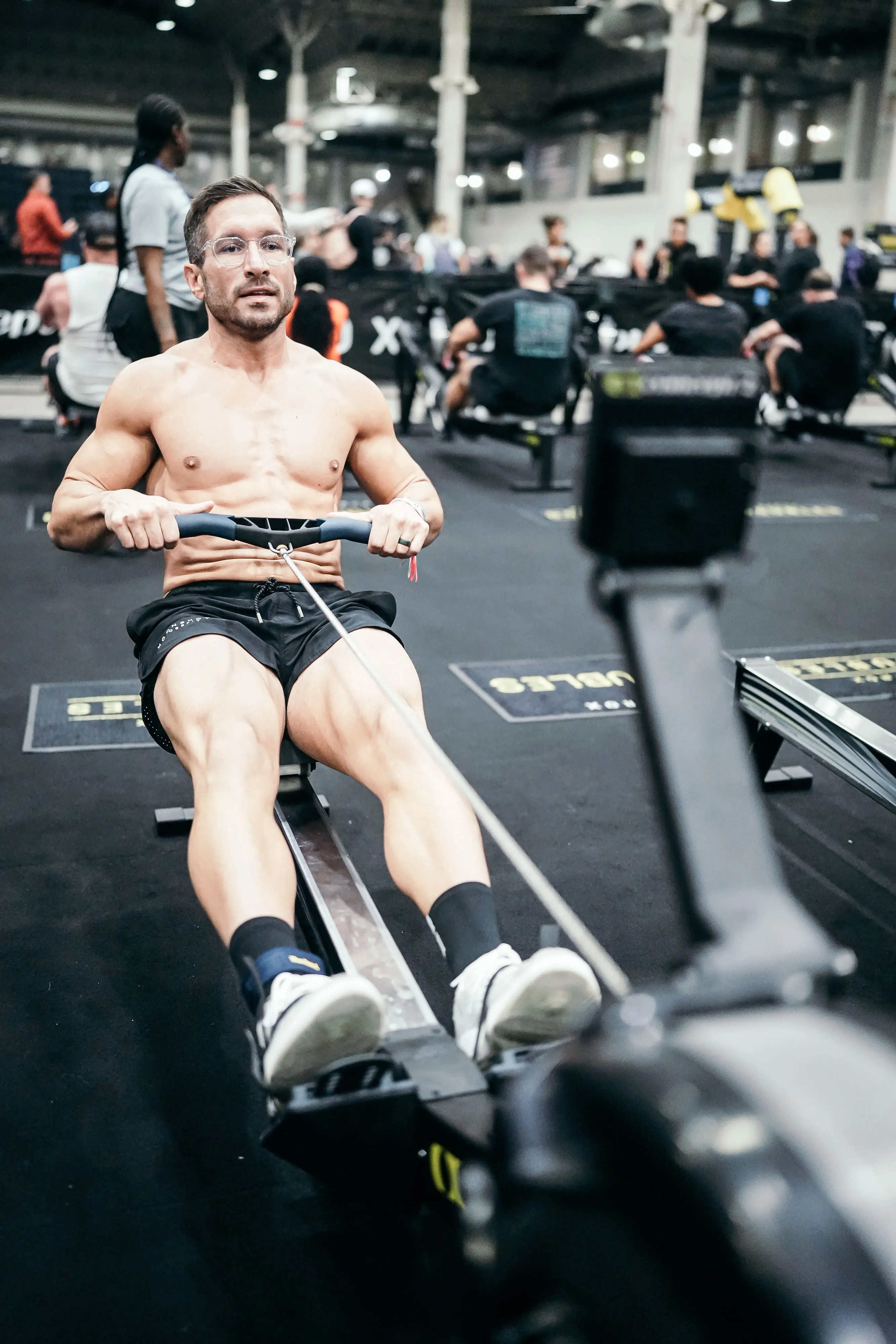 Moonshot athlete rowing at Hyrox