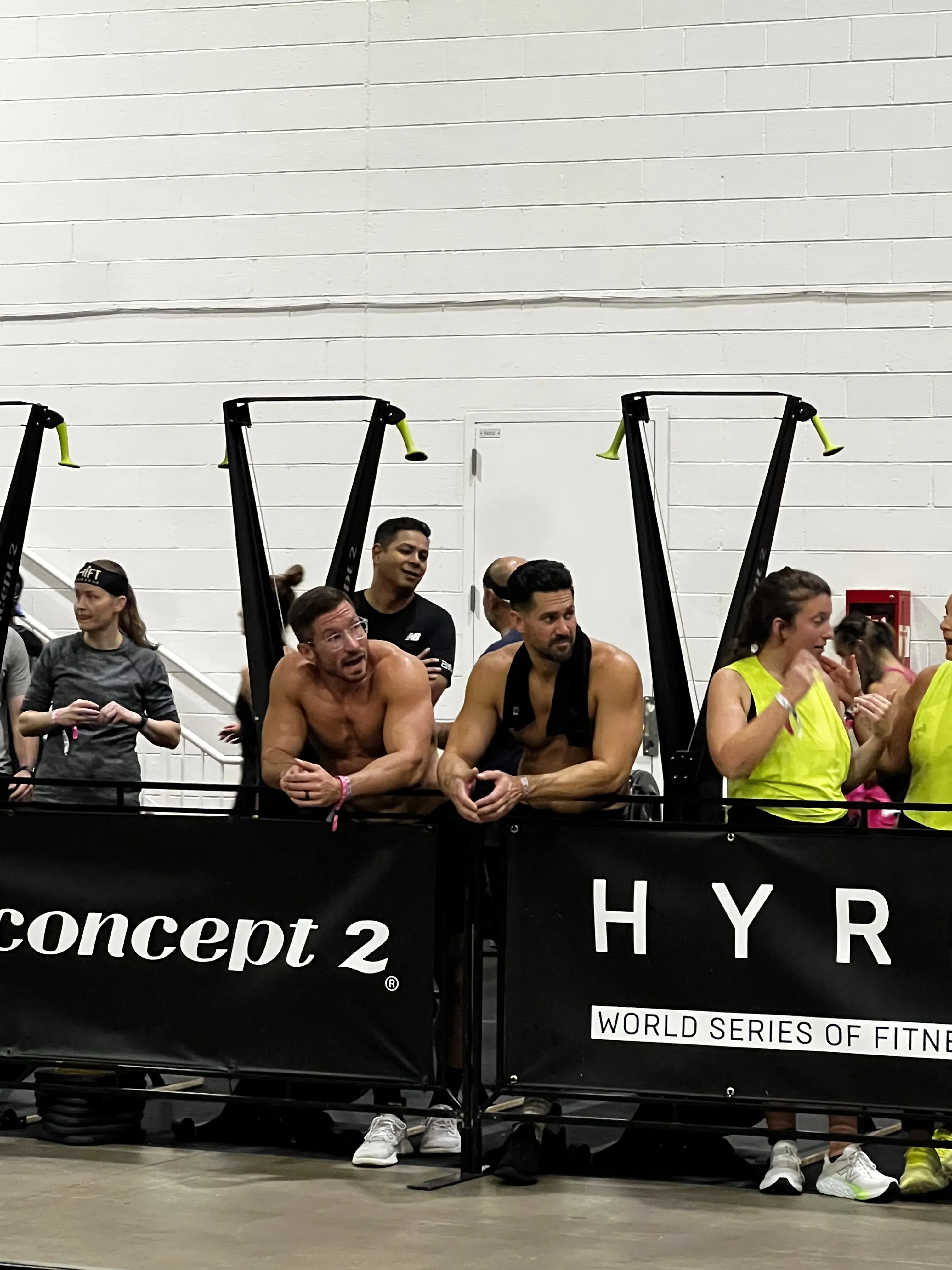Moonshot coaches at the SkiErg station during a HYROX race