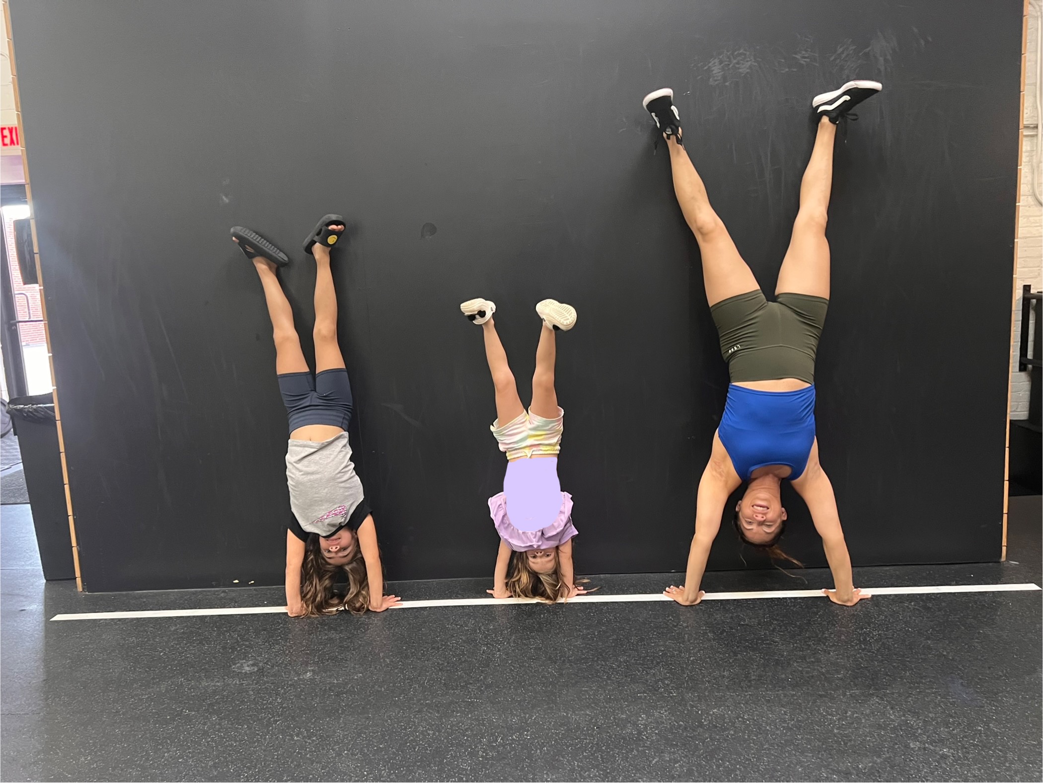 Sarah coaching a handstand